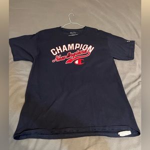 Champion Tee